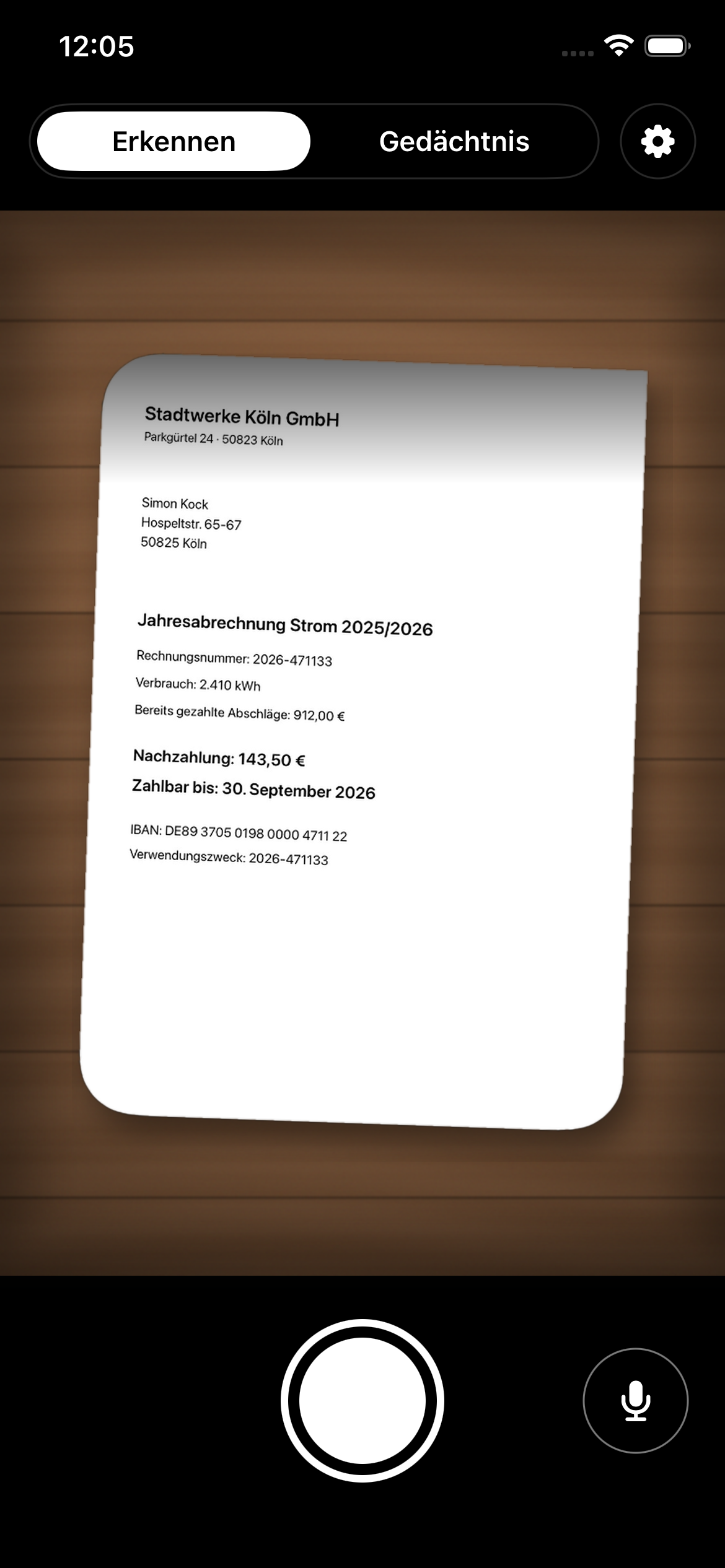 Tellme-Kameraansicht: ein Brief im Sucher, darunter Auslöser und Hold-to-talk-Mikrofon